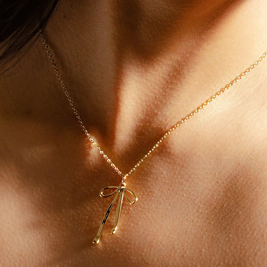 The Bad To The Bow Necklace - Gold