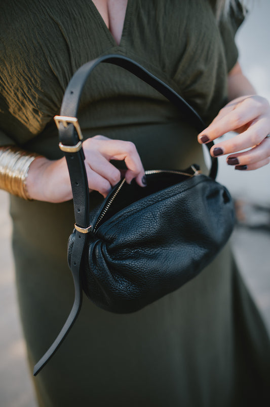The Livi Shoulder Bag by Dolce Vita - Black Leather